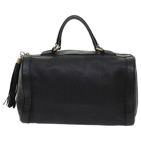 Sac de voyage soho Gucci Noir en Synthétique 